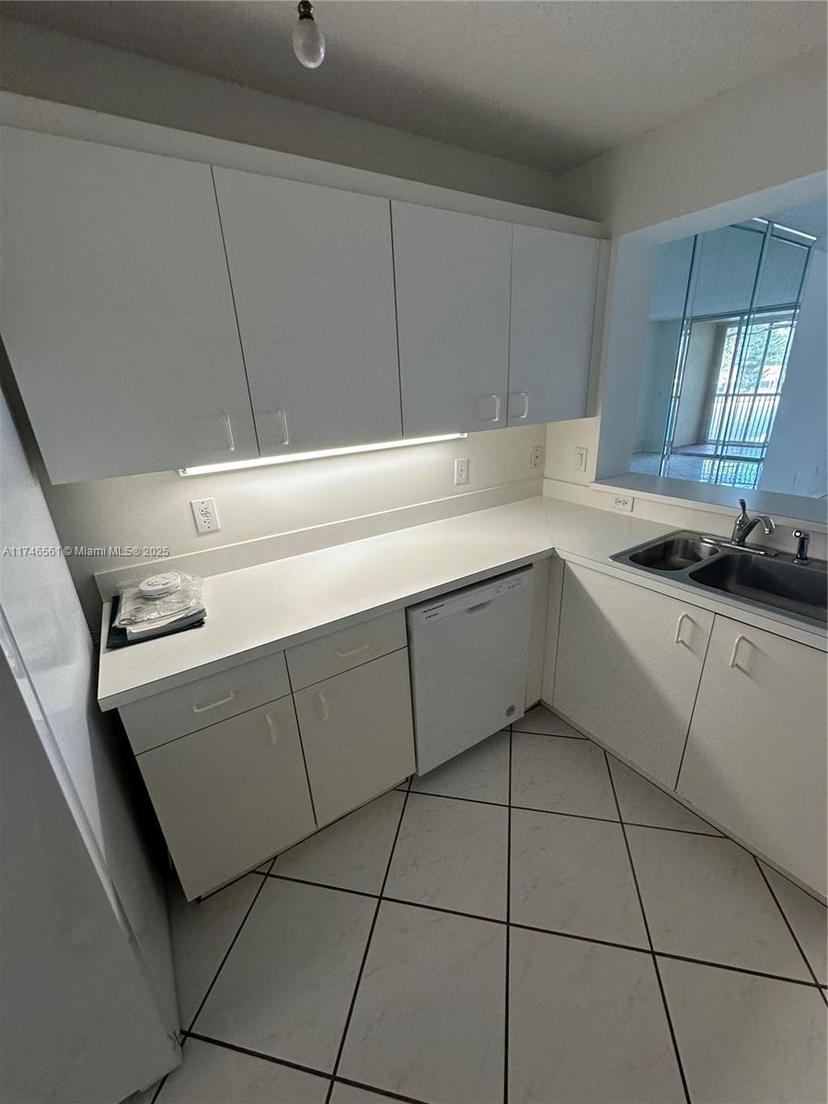 Picture of 9587 Weldon Cir # B203, Tamarac FL 33321