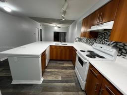 Picture of 5900 W Sample Rd # 303, Coral Springs, FL 33067