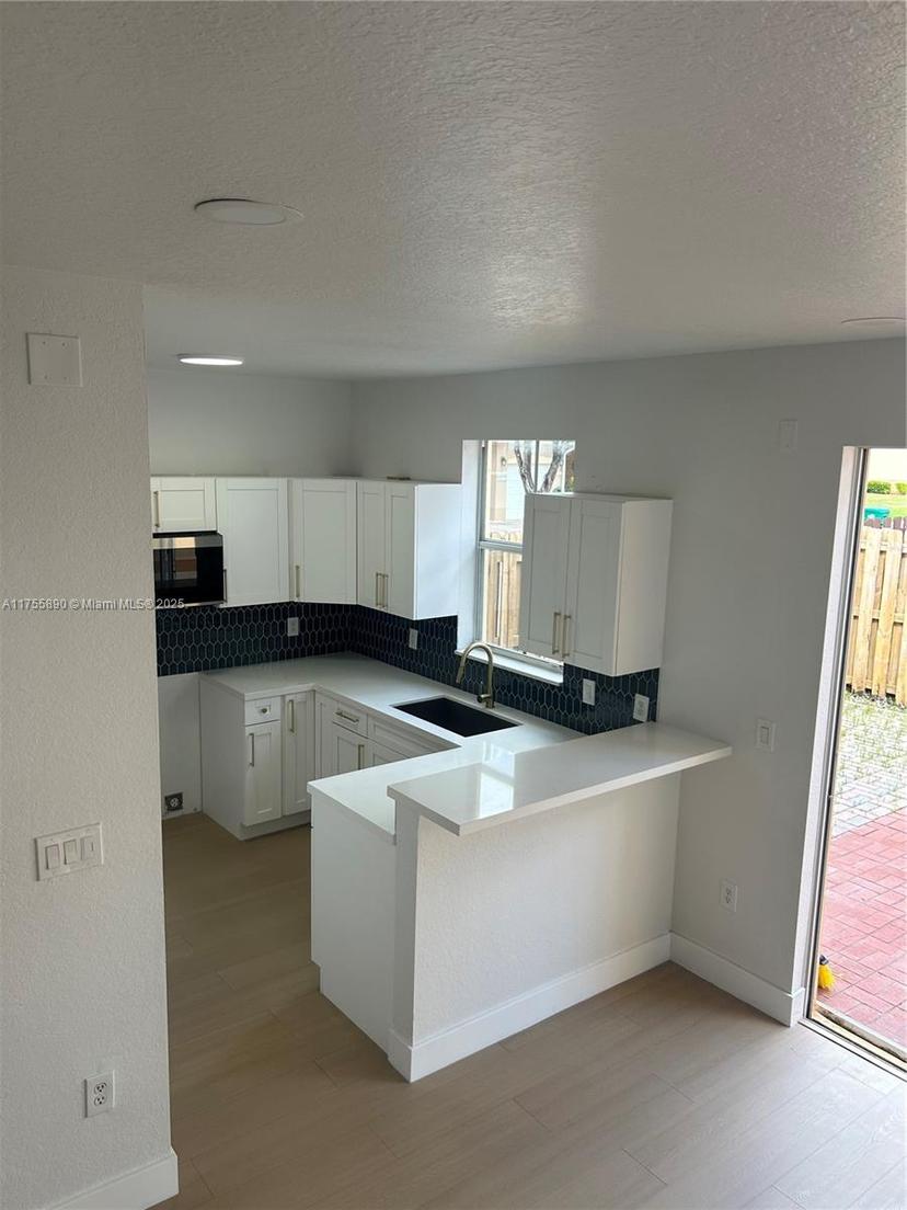 Picture of 12577 SW 125Th Ter # 12577, Miami FL 33186