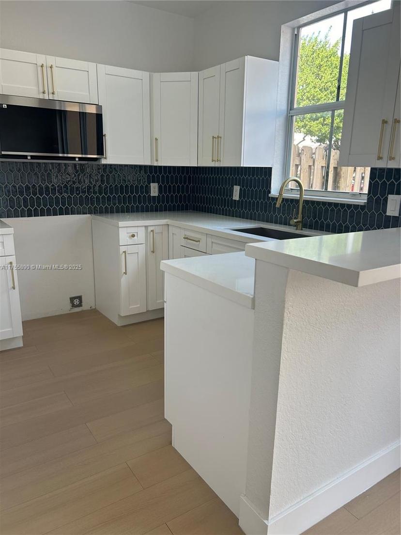 Picture of 12577 SW 125Th Ter # 12577, Miami FL 33186