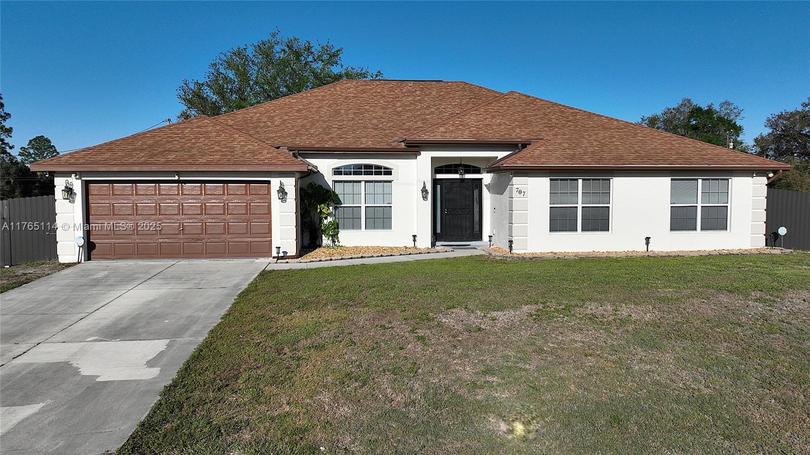 Picture of 707 Broadway Ave, Lehigh Acres, FL 33976