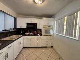Picture of 7900 Tatum Waterway Dr # 413, Miami Beach, FL 33141