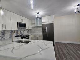 Picture of 7690 Tahiti Ln # 203, Lake Worth, FL 33467
