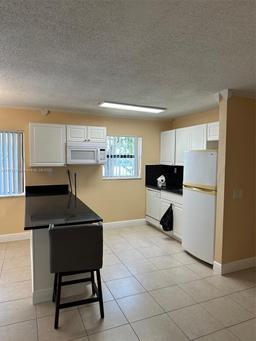 Picture of 111 Meadows Cir # 111, Boynton Beach, FL 33436