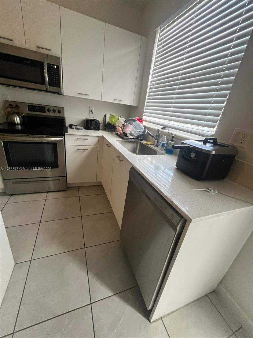 Picture of 12121 NW 23 Court # 12121, Miami FL 33167