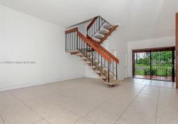 Picture of 717 NW 105Th Pl # C2, Miami, FL 33172