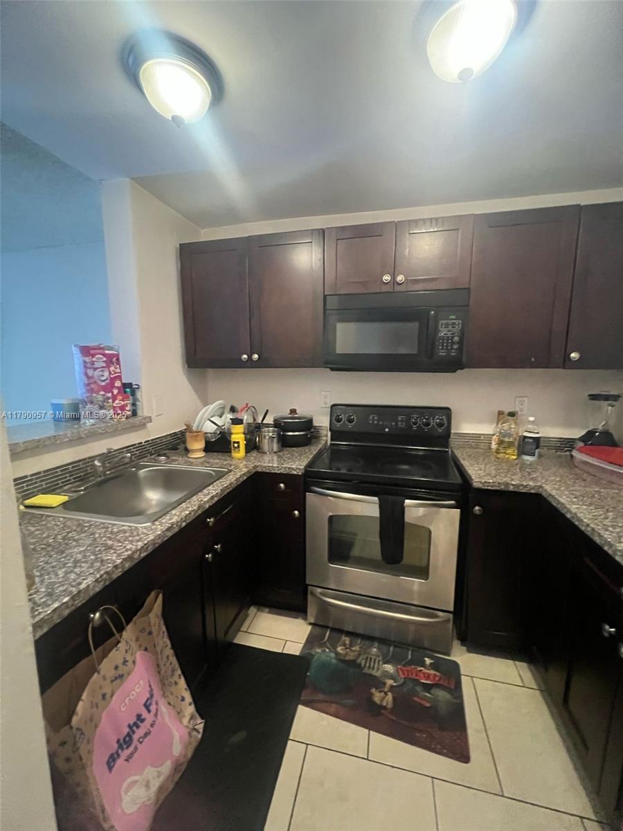 Picture of 482 NW 165Th St Rd # A203, Miami, FL 33169