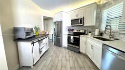 Picture of 6755 W Broward Blvd # 302, Plantation, FL 33317