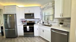 Picture of 6755 W Broward Blvd # 302, Plantation, FL 33317