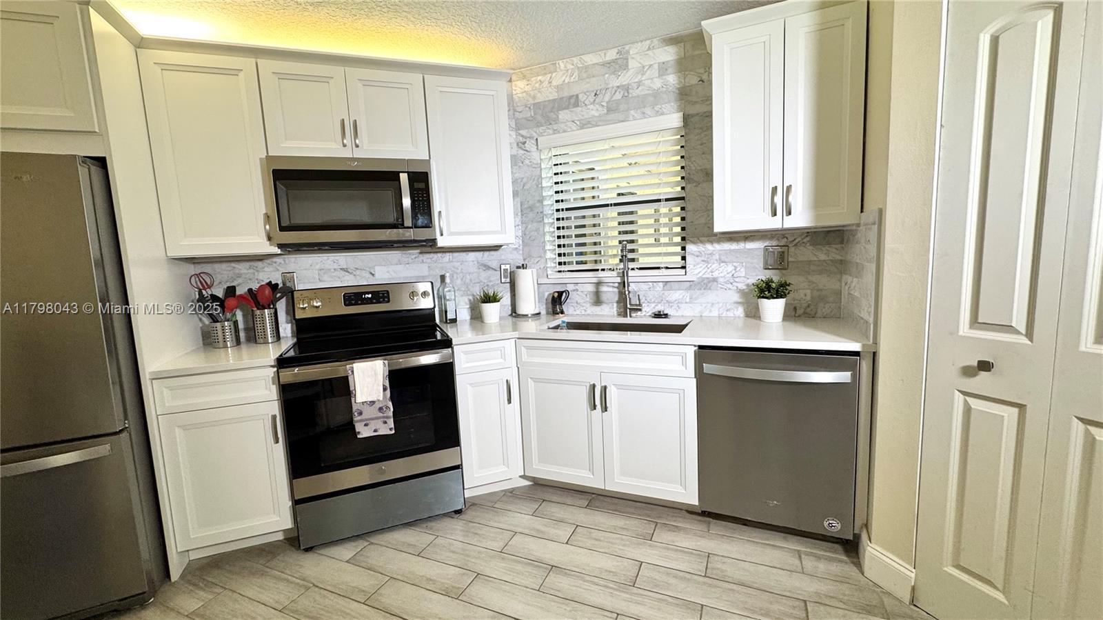 Picture of 6755 W Broward Blvd # 302, Plantation, FL 33317
