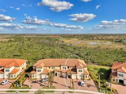 Picture of 10039 Crooked Creek Drive Unit 203, Venice, FL 34293