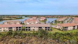 Picture of 10031 Crooked Creek Drive Unit 201, Venice, FL 34293