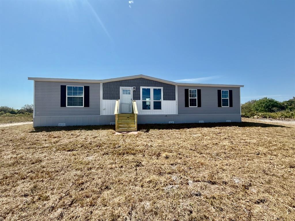 Picture of 18720 NW 242Nd Street Unit K, Okeechobee, FL 34972