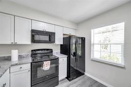 Picture of 3147 Mission Grove Drive Unit 3147, Palm Harbor, FL 34684
