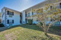 Picture of 200 Glennes Lane Unit 201, Dunedin, FL 34698