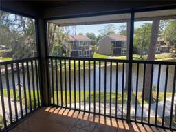 Picture of 5926 Peregrine Avenue Unit A13, Orlando, FL 32819