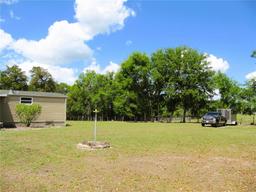 Picture of 4176 County Road 110, Oxford, FL 34484