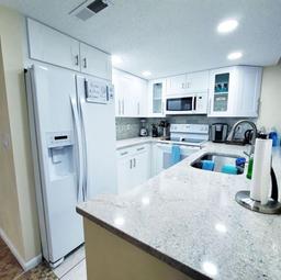 Picture of 323 Rex Place Unit G, Madeira Beach, FL 33708
